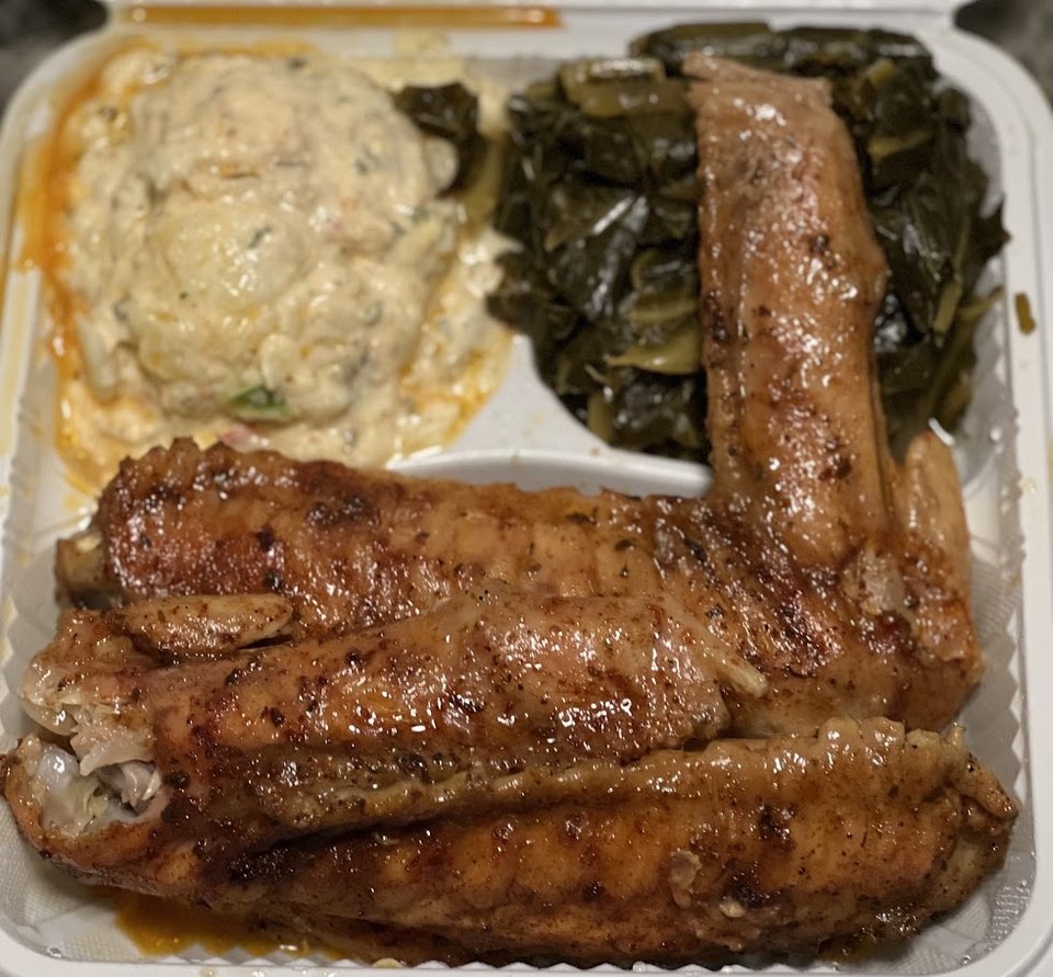 Comfort food plates on a casual restaurant table.